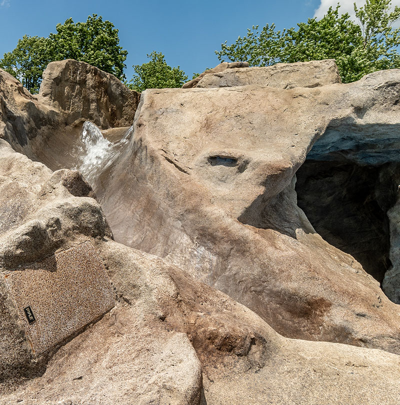 Poolside slides grottoes waterfalls